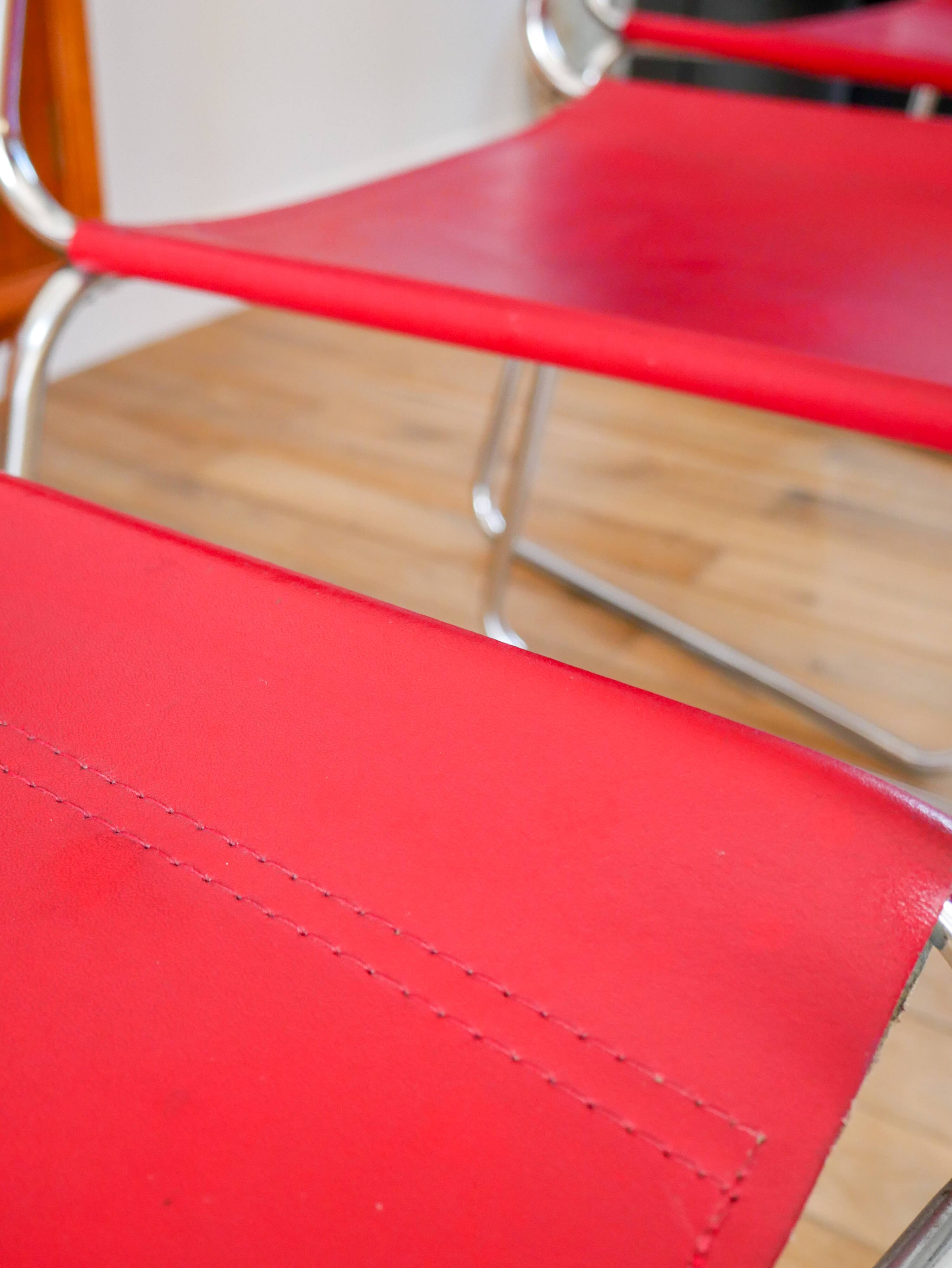 Set of 4 tubular chairs in Red Italy split leather, Design, 1970