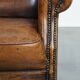 Fauteuil vintage en cuir de mouton avec dossier haut