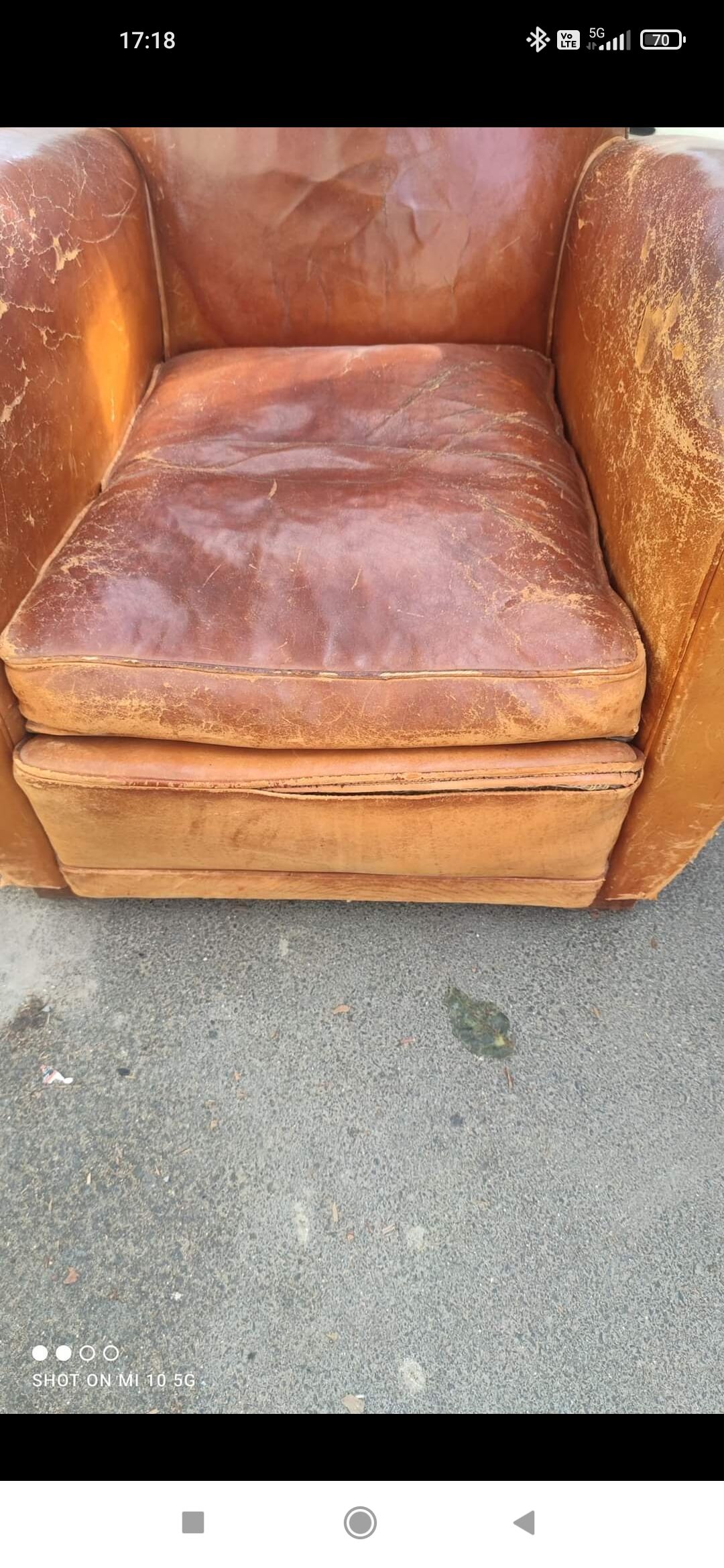Pair of club chairs with moustache-shaped handles in Havana leather, in their original condition, circa 1930