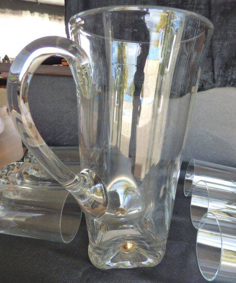 Vintage orangeade service with a jug and 6 glasses decorated with golden beads.