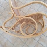 Wooden and cane rocking chair