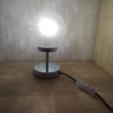 Duo of lamps in textured globe with a great play of light.