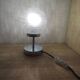 Duo of textured globe lamps with a large play of light.