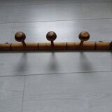 Wooden wall coat rack