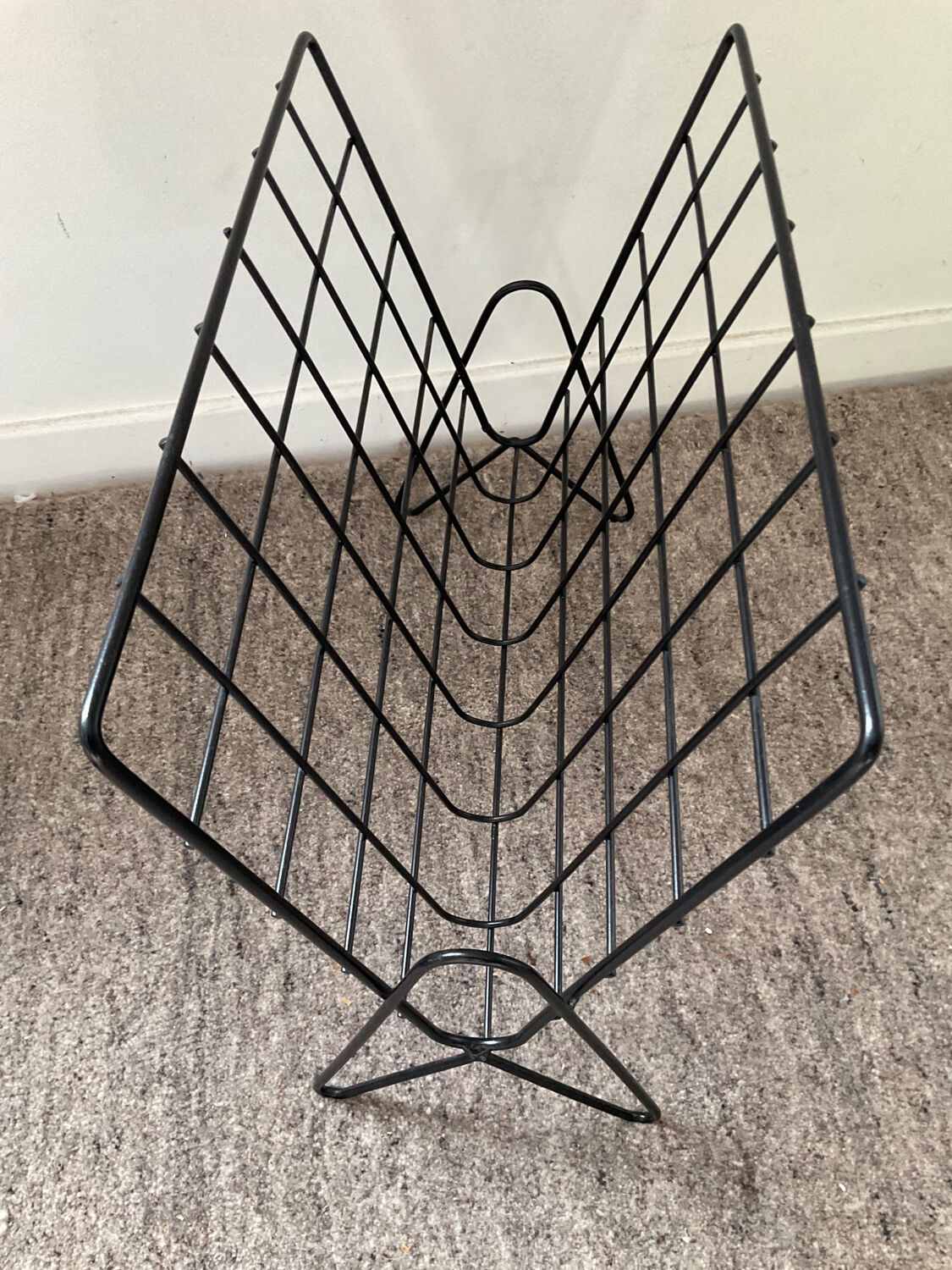 Vintage wired metal magazine rack