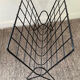Vintage wired metal magazine rack