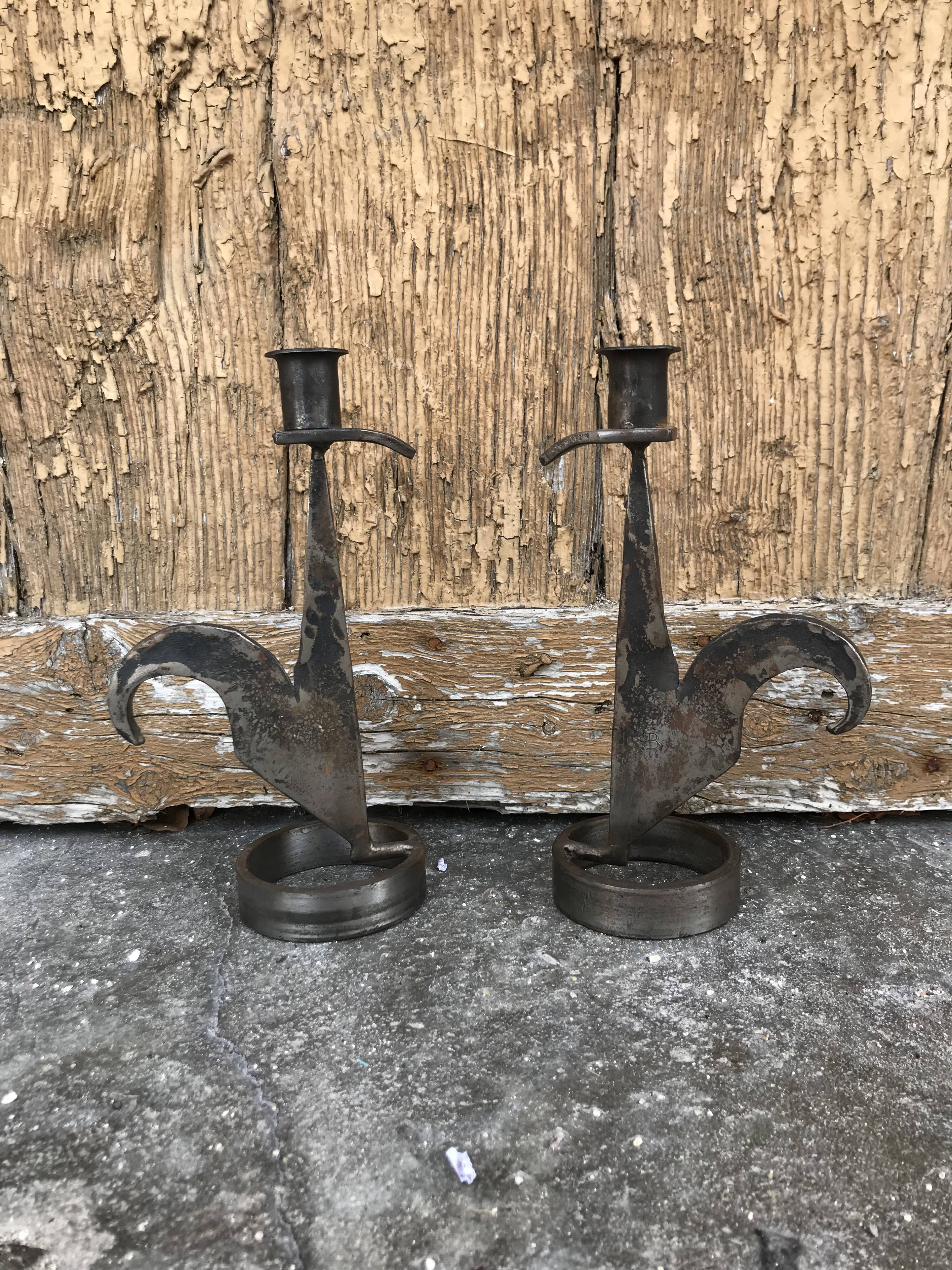 Signed zoomorphic iron candle holders