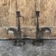 Signed zoomorphic iron candle holders