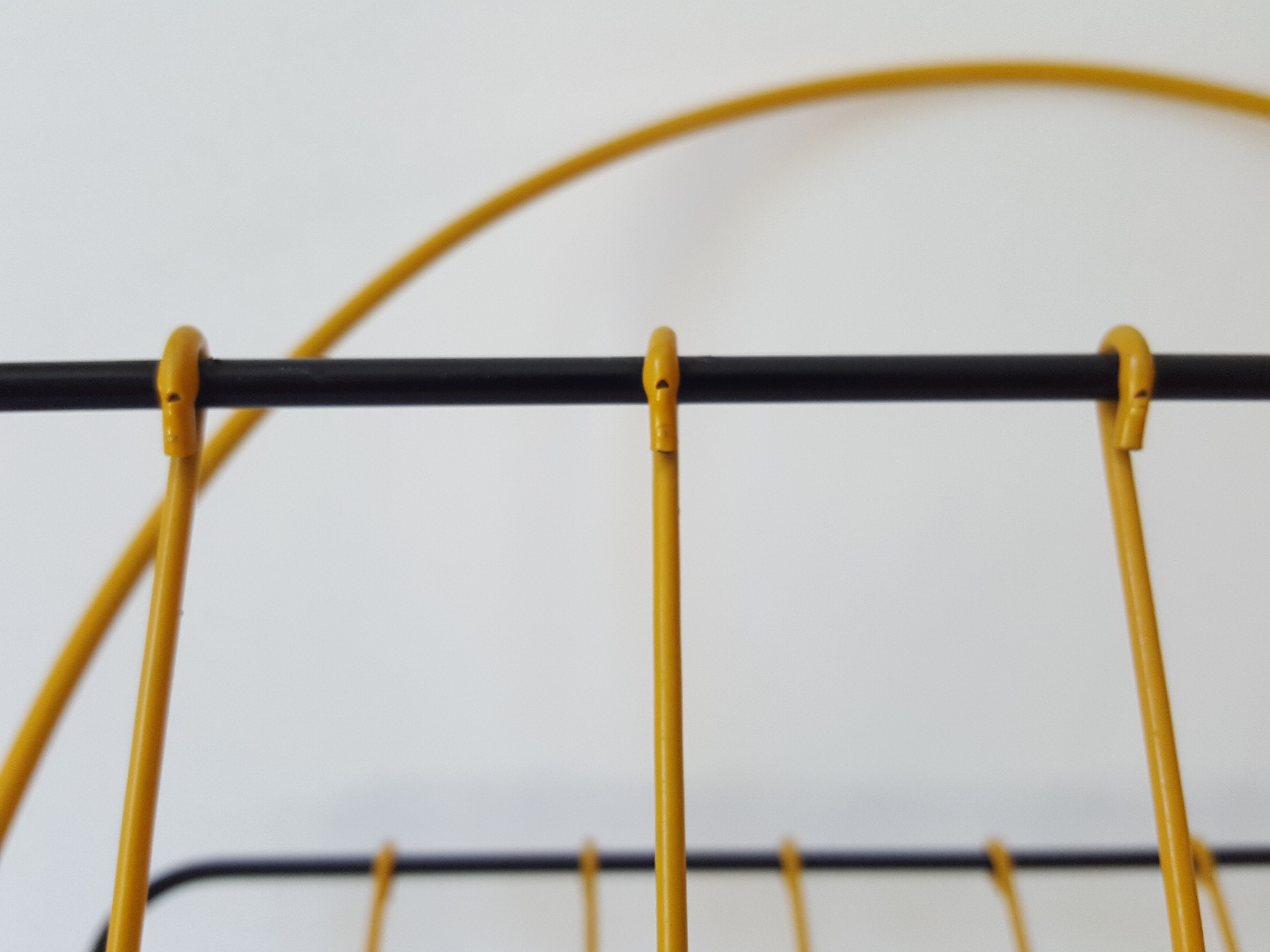 Black and yellow metal magazine holder 70s