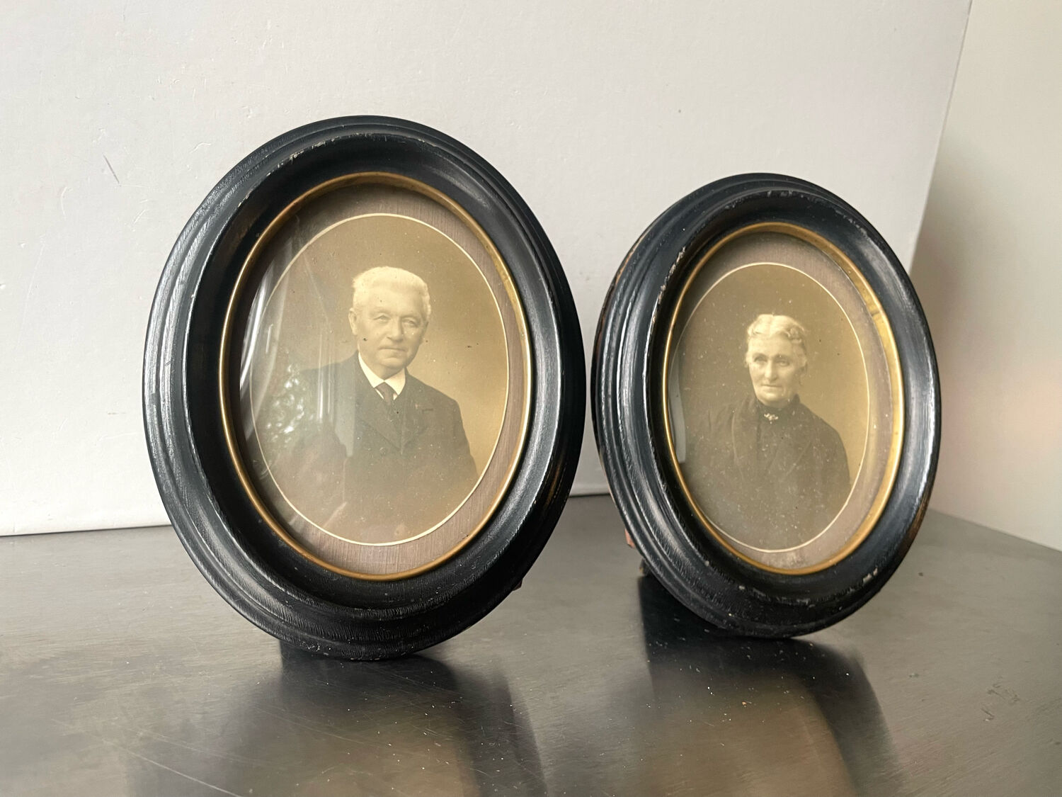 Antique pair of black wooden oval frames each 16.5 cm x 13 cm