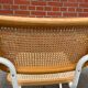 Cesca model chair with armrests white