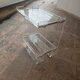 Plexiglas and gold metal rolling table