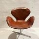 First edition Arne Jacobsen Swan chair, original patinated leather, 1950s