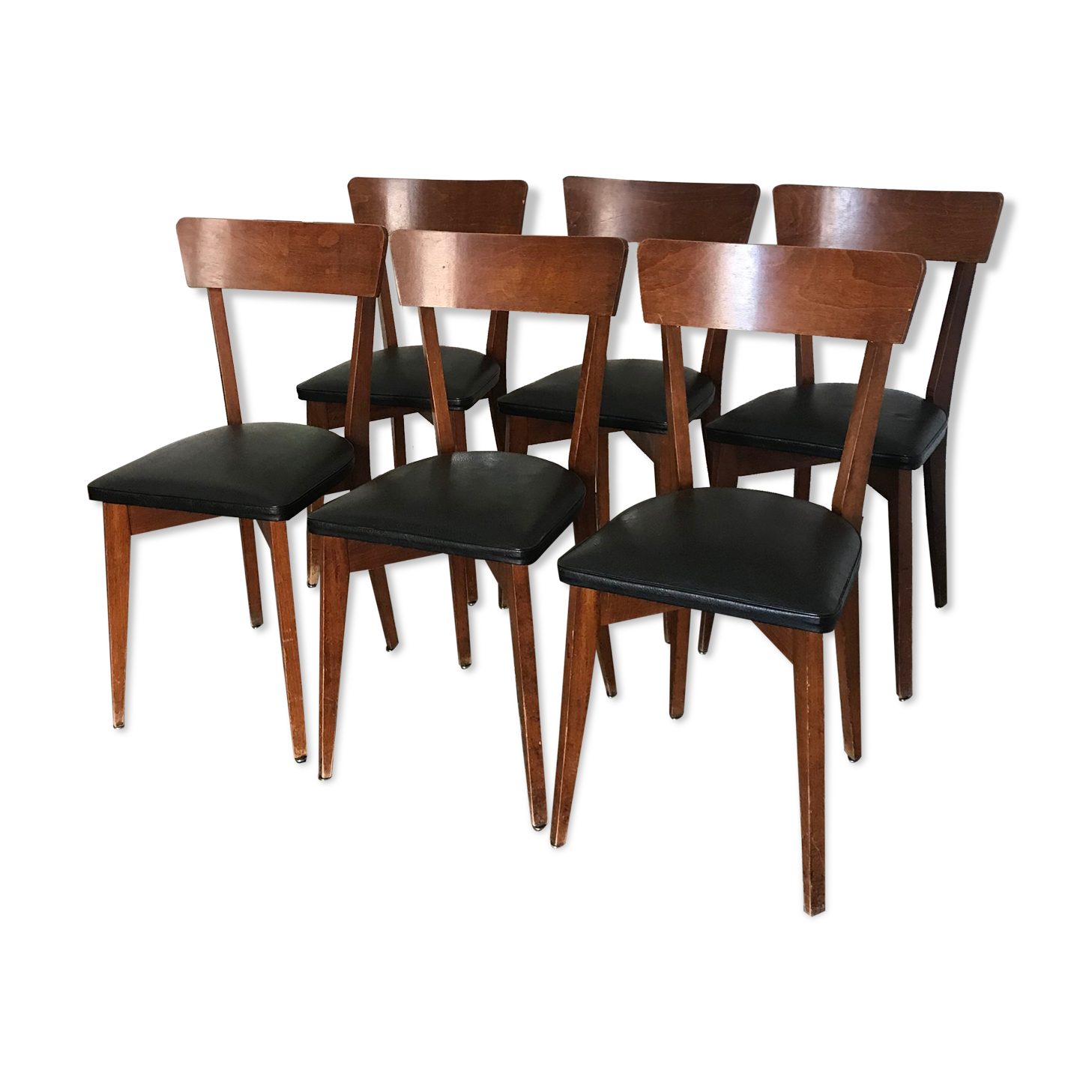 Vintage wooden and black skai chairs