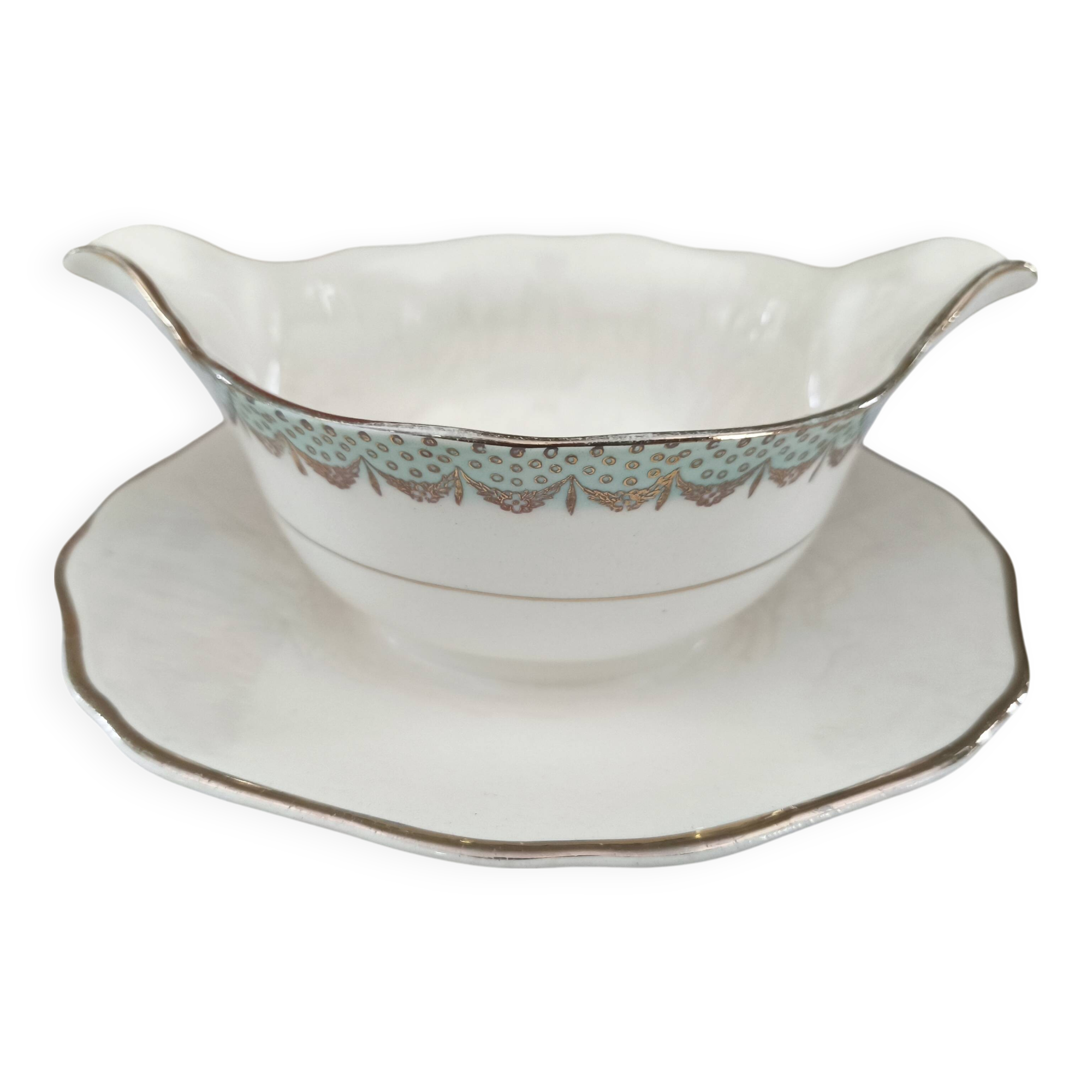 Round sauceboat on Longwy France earthenware frame, Trianon model