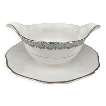 Round sauceboat on Longwy France earthenware frame, Trianon model