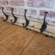 Solid teak coat hook with 4 double cast iron hooks