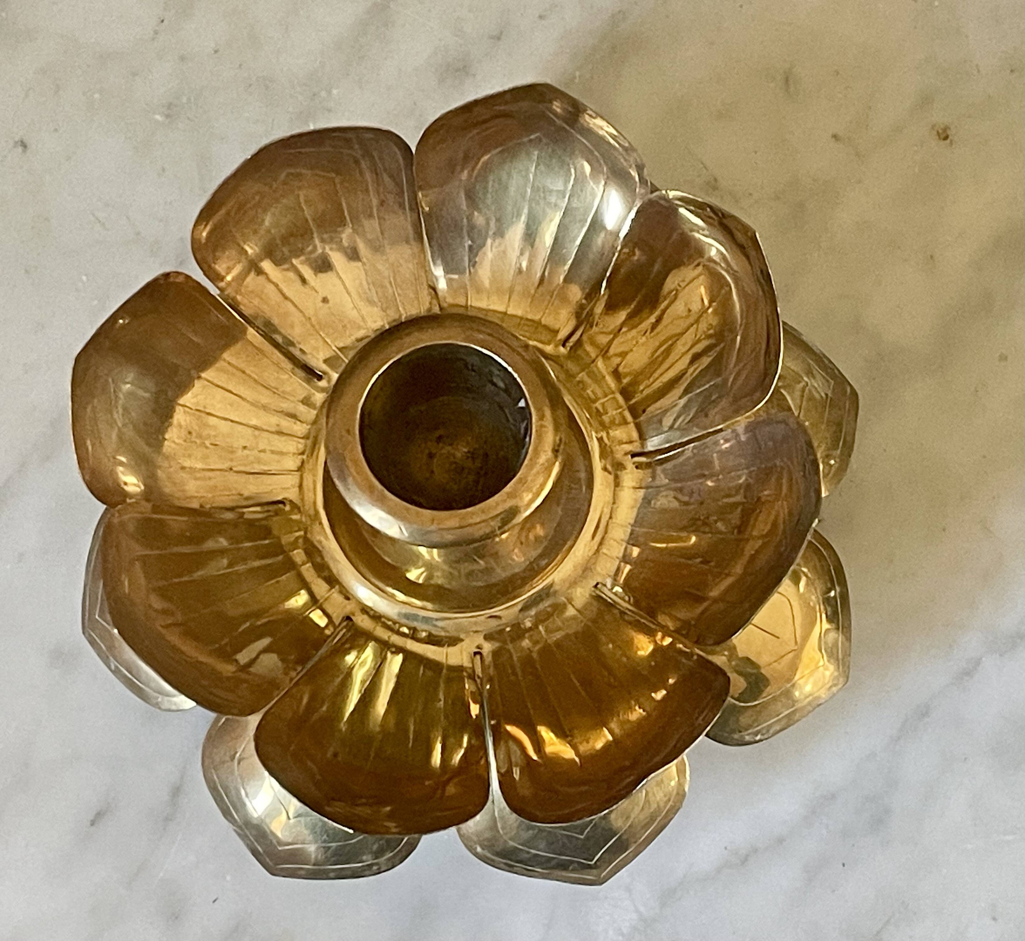 Lotus brass candlestick pair