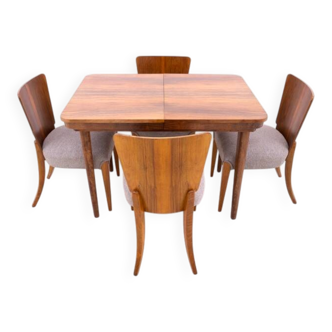 Dining table with four chairs, first half of the 20th century. After renovation.