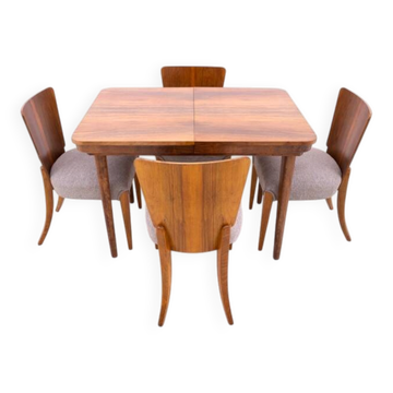 Dining table with four chairs, first half of the 20th century. After renovation.