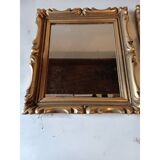 Pair of wood and gilded stucco mirrors