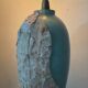 Vintage lamp base in Mactan stone and green marble.