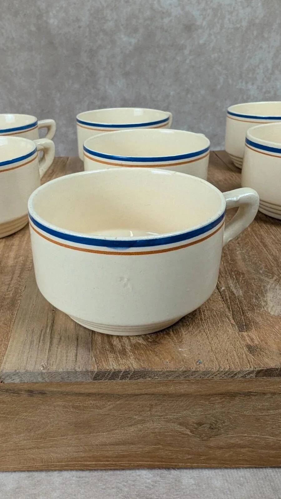Set of 7 vintage cups Moulin des Loups – Blue and ochre trim, retro charm