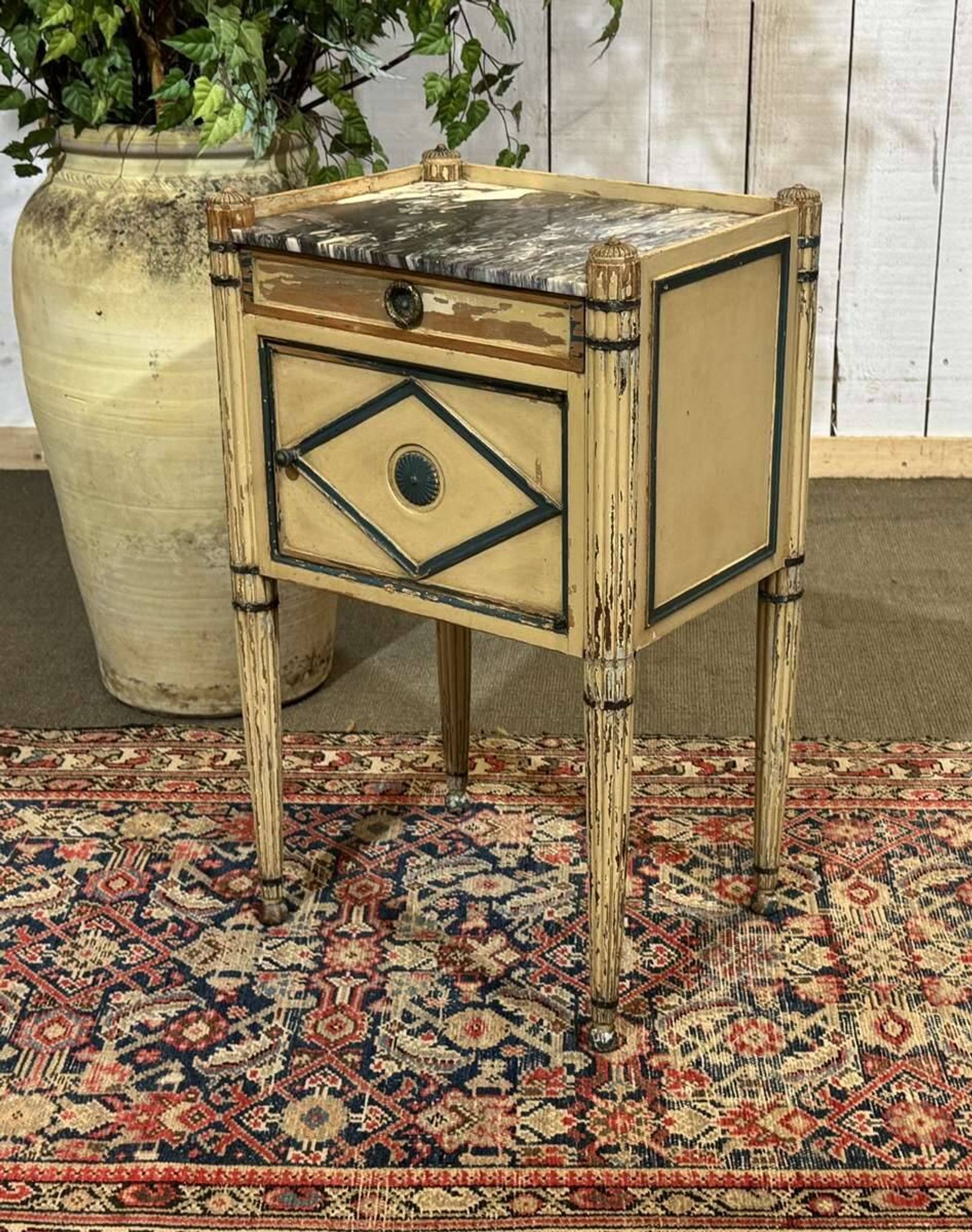 Beech bedside table painted with a marble top in Louis XVI style from the late 19th century.