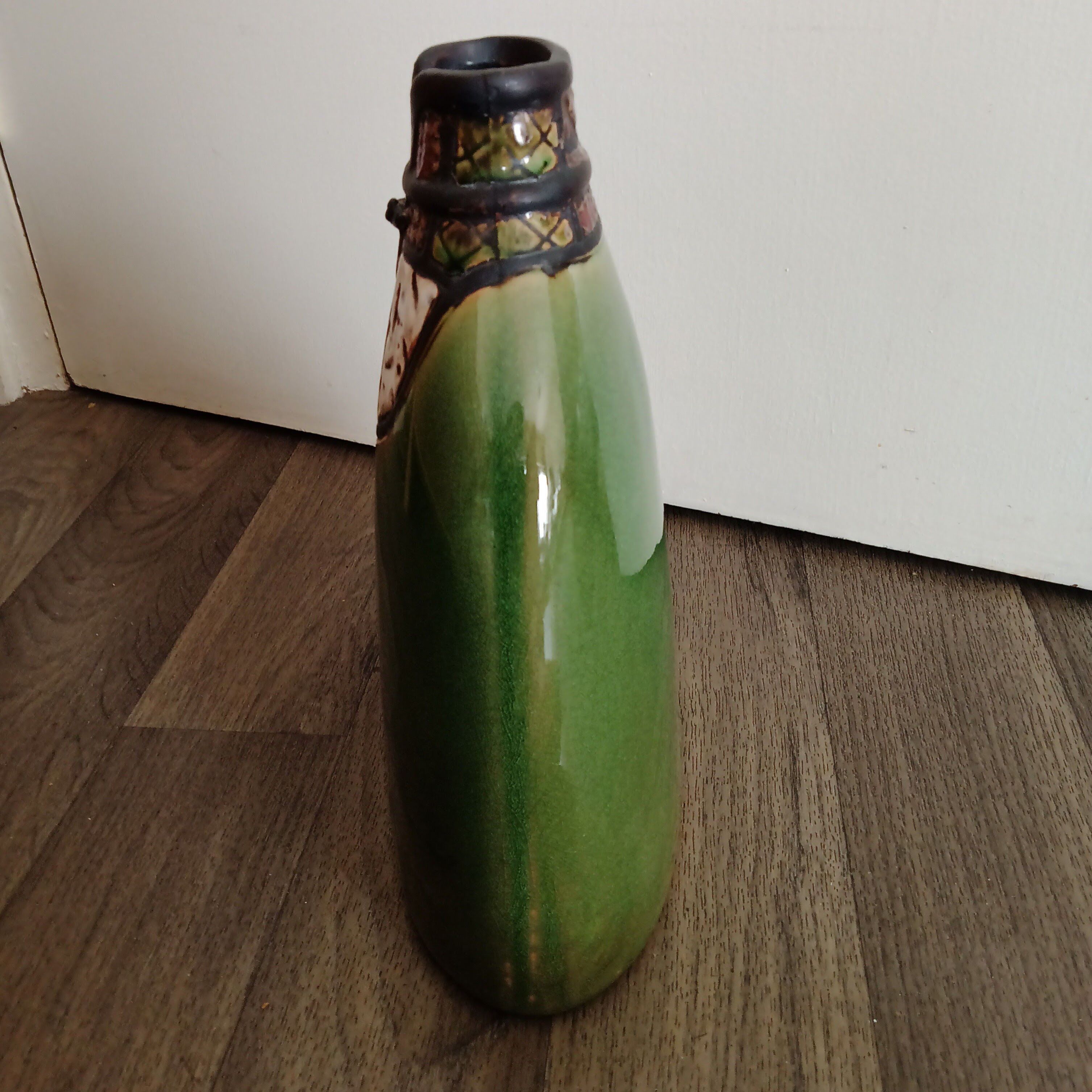 Vase in the shape of an Asian shirt. Height 27 cm