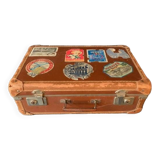 Old travel suitcase and legendary stickers, 1920