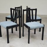 Set of 4 modernist black chairs with light blue ribbed fabric