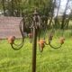Coat rack called jellyfish, umbrella cane holder, iron and wood bistro parrot