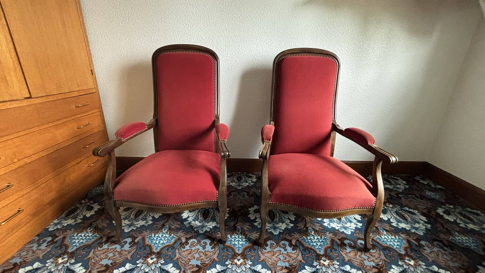 Lot of red velvet Voltaire armchairs