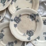 7 assiettes à dessert en terre de fer "Marguerite" faïencerie Nouvelle Givors