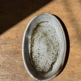Petit plat ovale en céramique mouchetée glacée L23