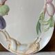Very large serving dish with hares and vegetables.