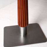 Mahogany bar table with steel base and carved stem