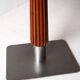 Mahogany bar table with steel base and carved stem