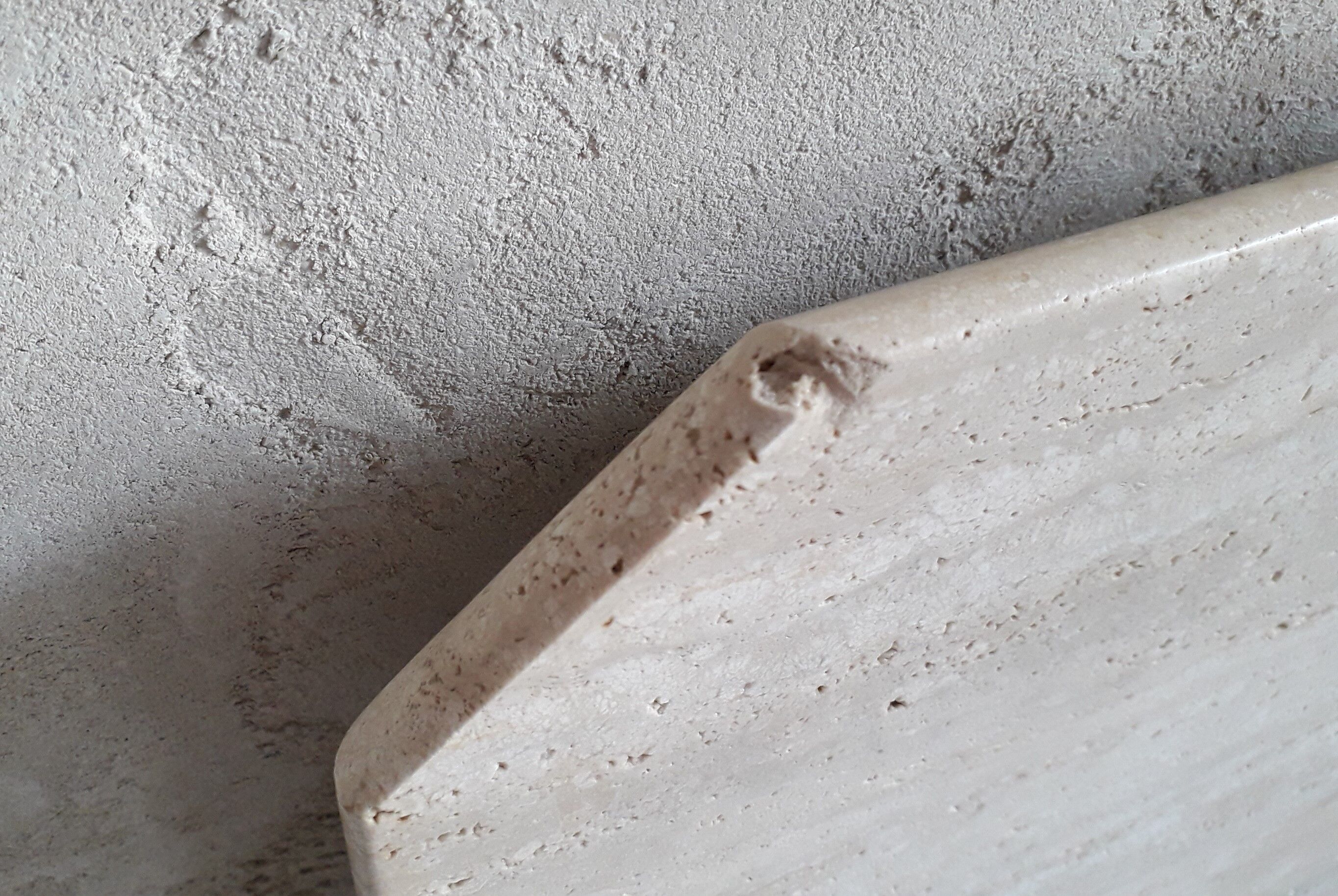 Coffee table in travertine
