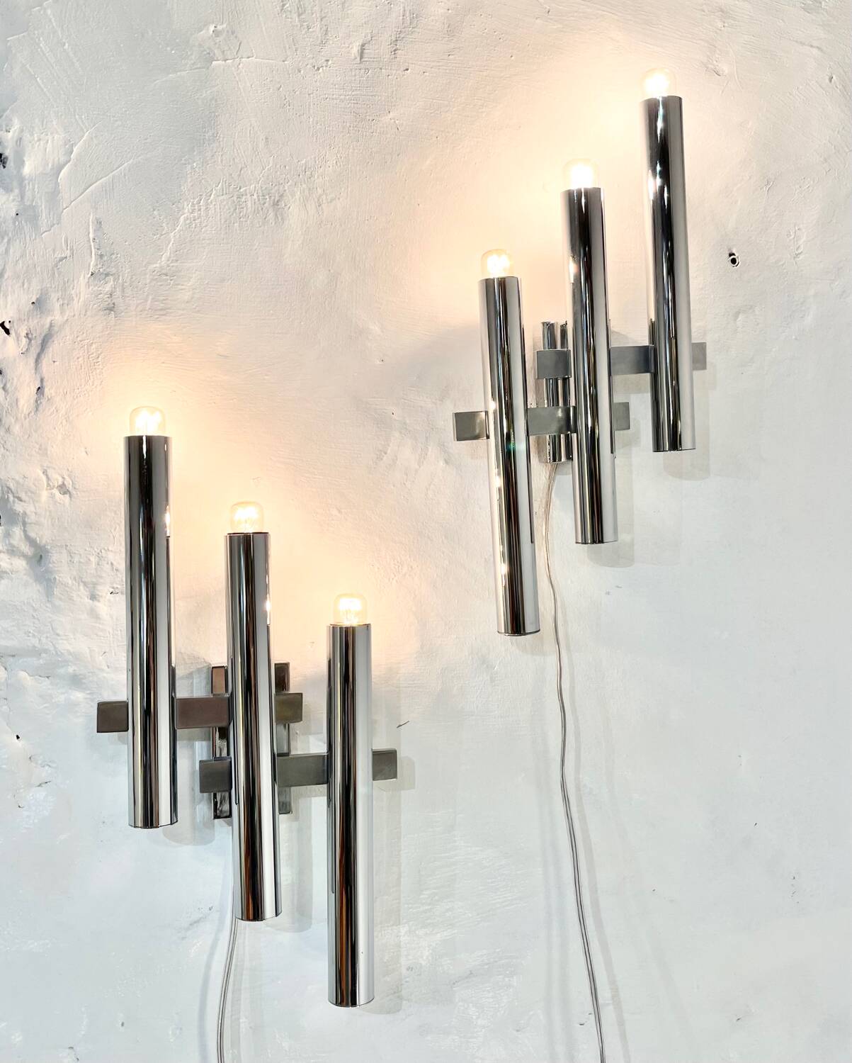 Pair of chrome wall lights by Gaetano Sciolari, 1970's