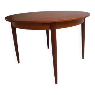 Scandinavian style dining table in vintage teak