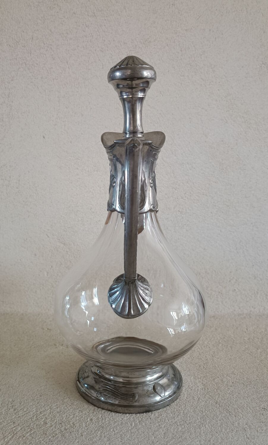 Ewer decanter with tin mount