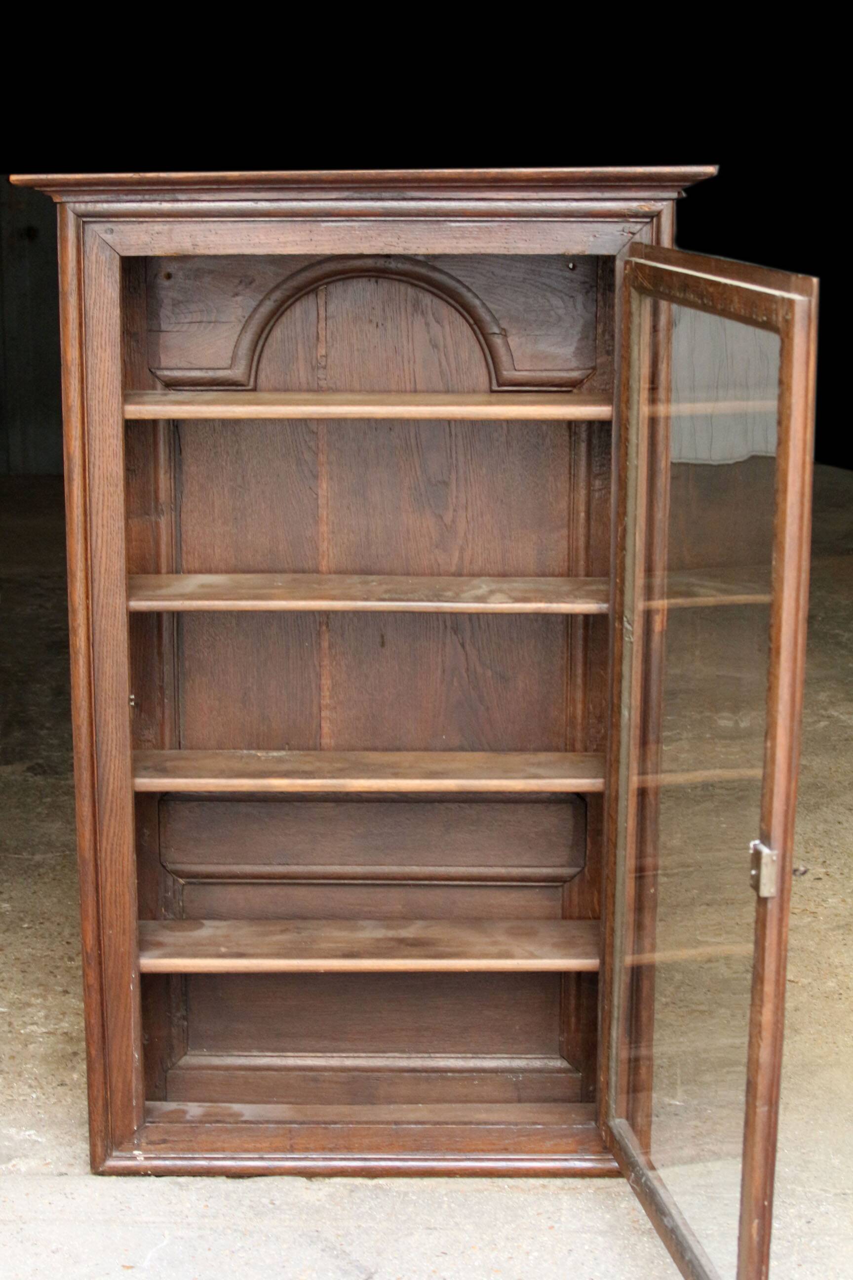 Elegant 18th century solid oak display cabinet.