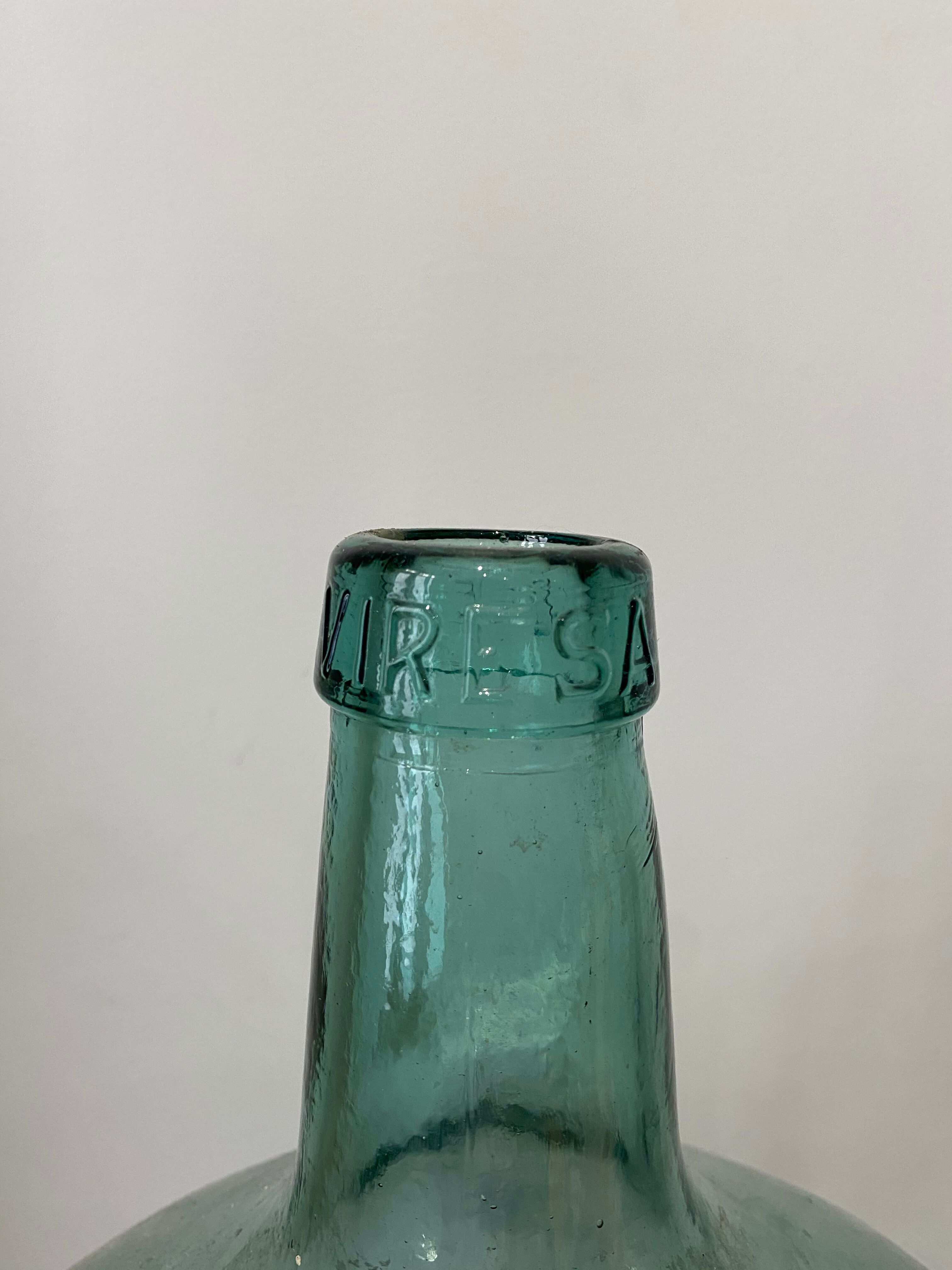 Clear green demijohn