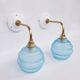 Vintage brass and blue glass wall lights
