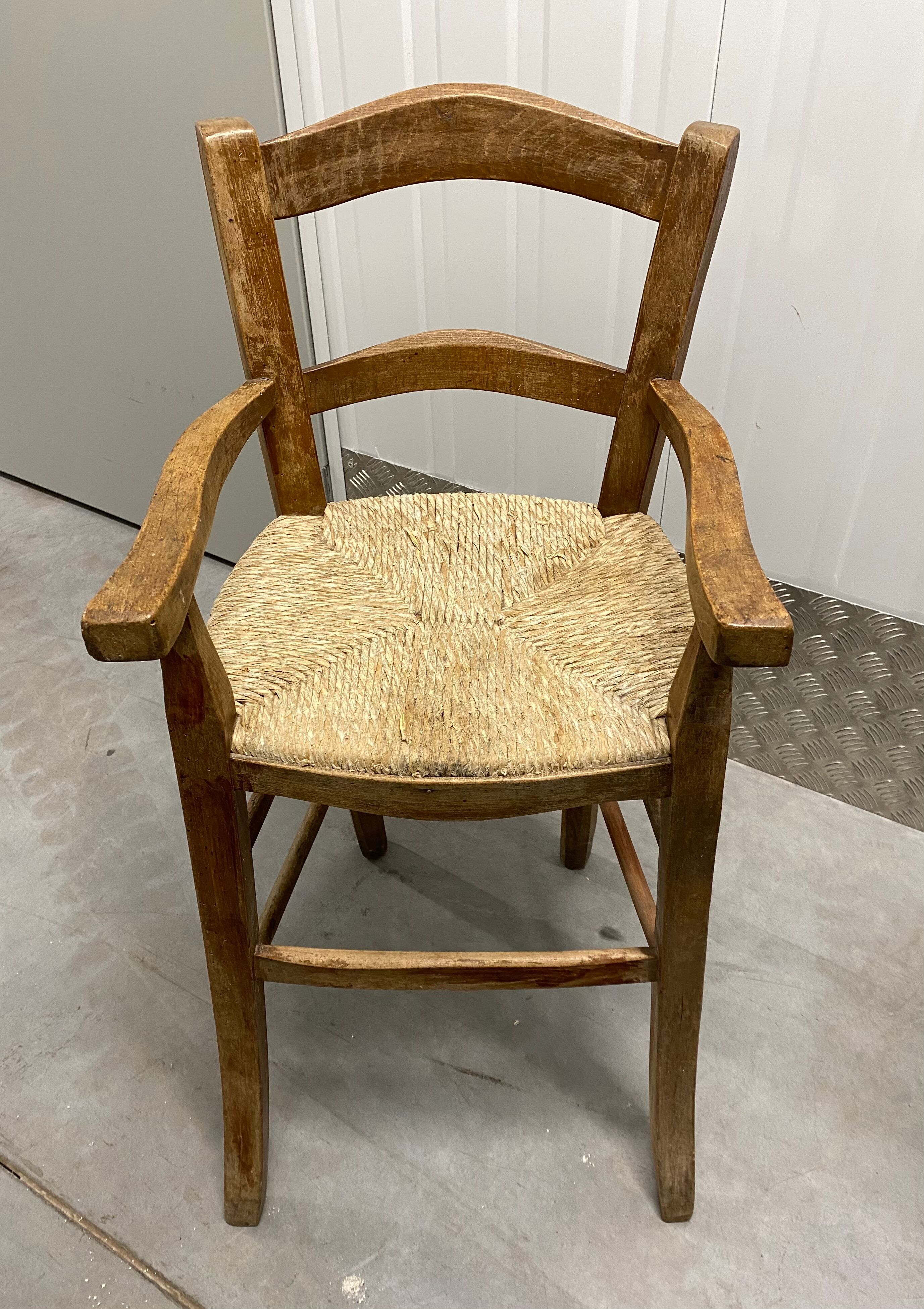 Wooden children's high chair and mulched seat