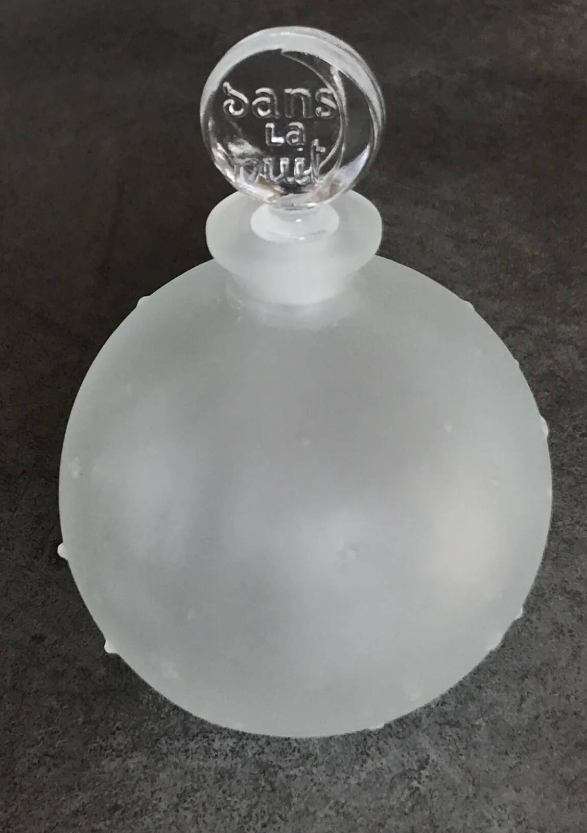 Lalique bottle in the night, frosted glass, ball shape