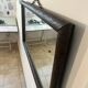 Large vintage mirror with a carved solid wood frame.
