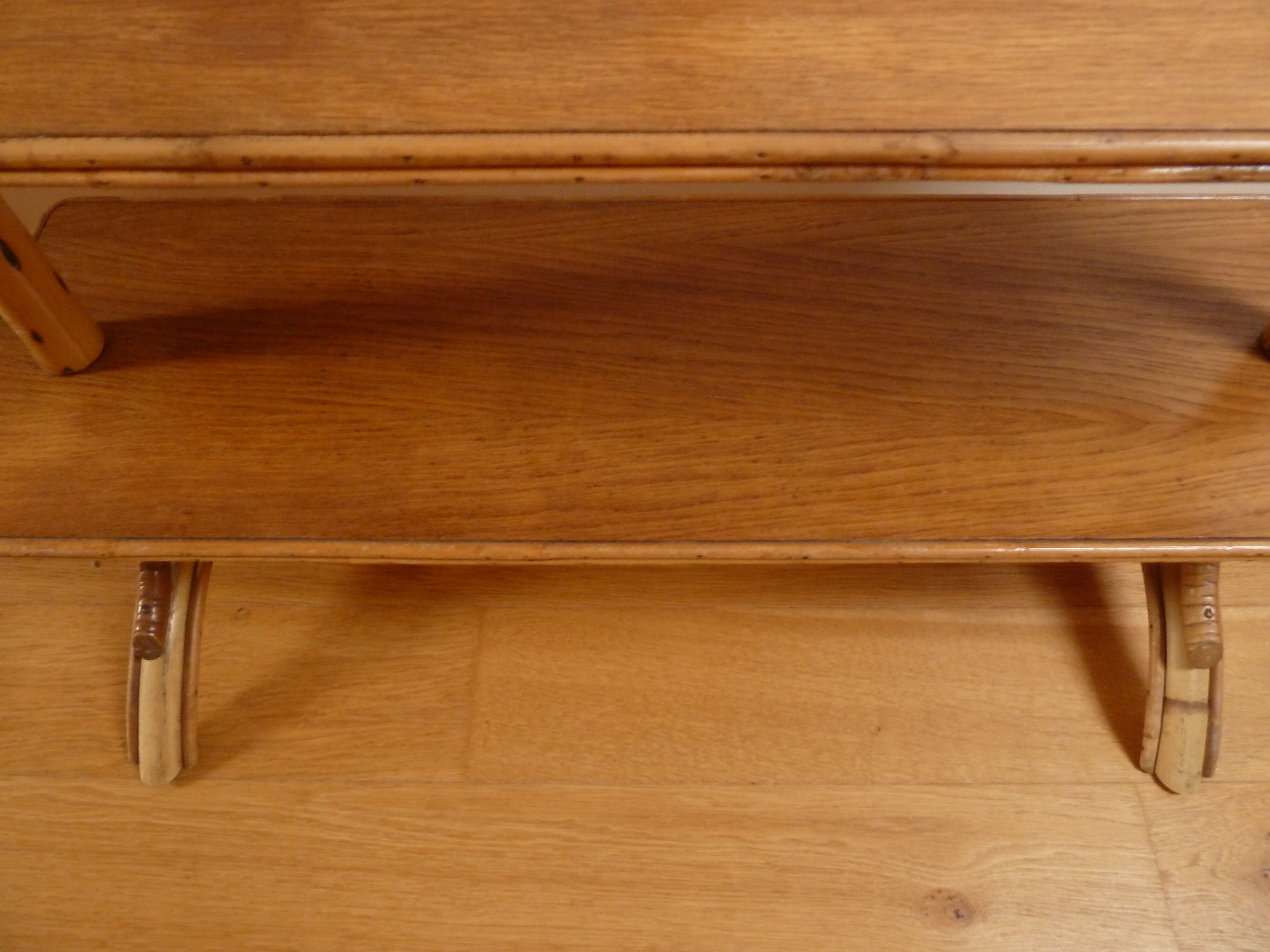 Asymmetrical rattan and wood shelf