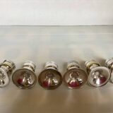 Six silver-plated metal candlesticks with punches